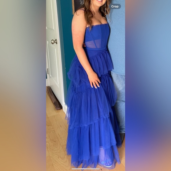 It is made of a mesh material, it is see through on the stomach only, blue dress - Picture 2 of 10